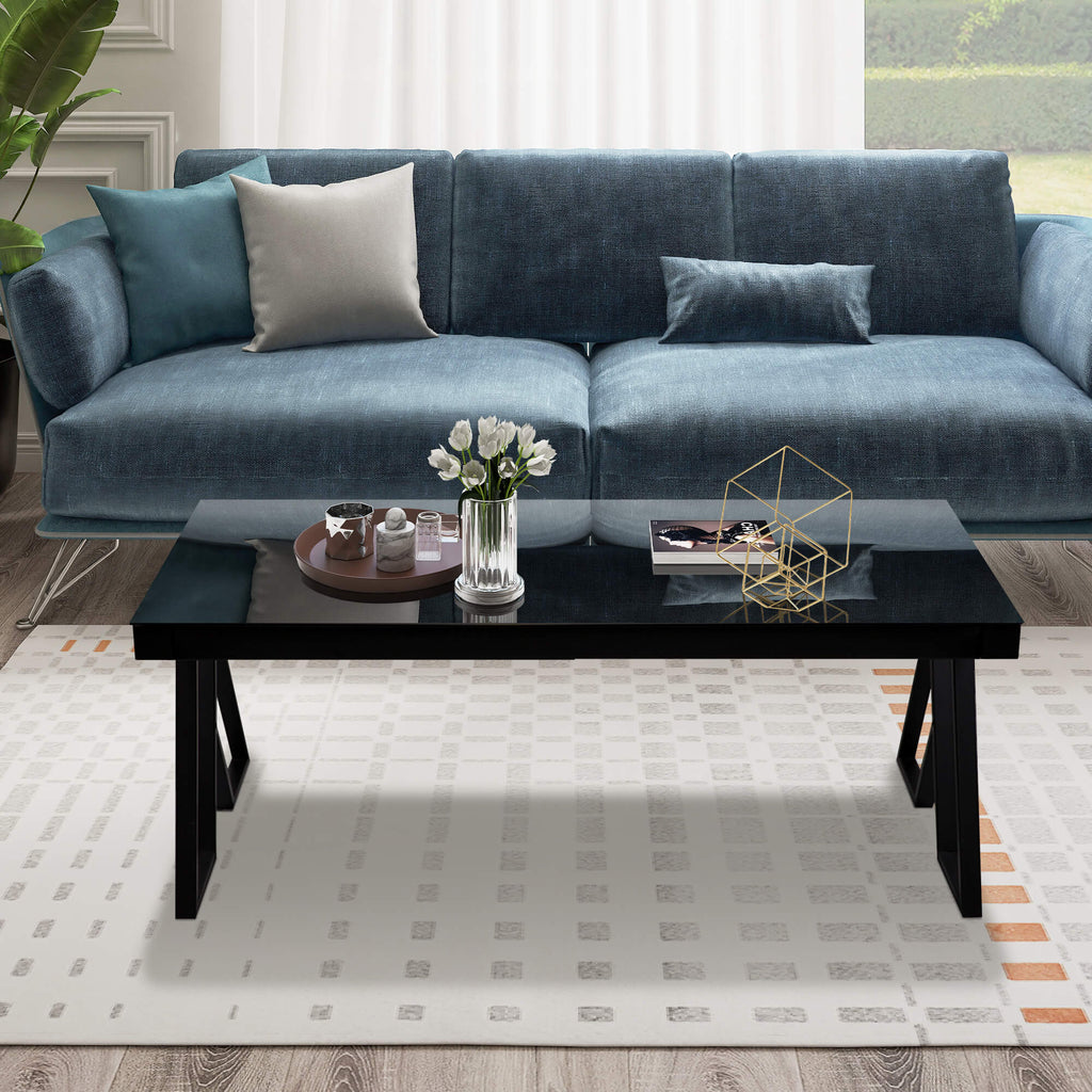 J.M.Deco 47" Tempered Glass Coffee Table   Black Triangular Metal Legs front