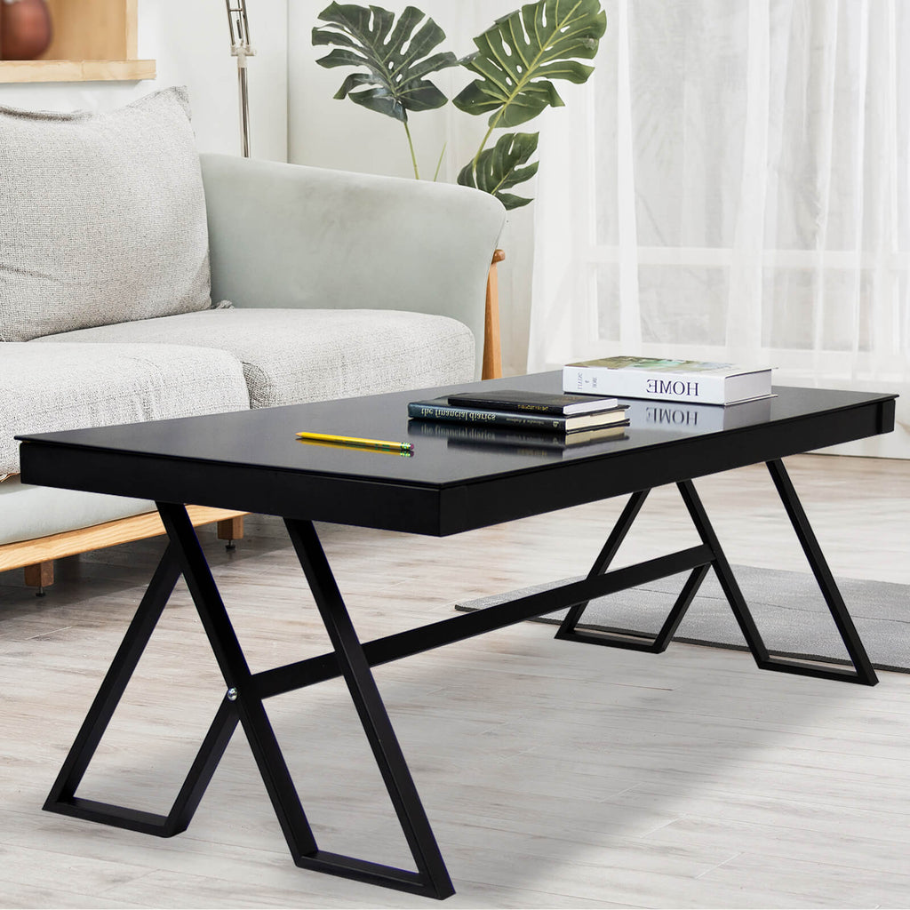 J.M.Deco 47" Tempered Glass Coffee Table   Black Triangular Metal Legs side